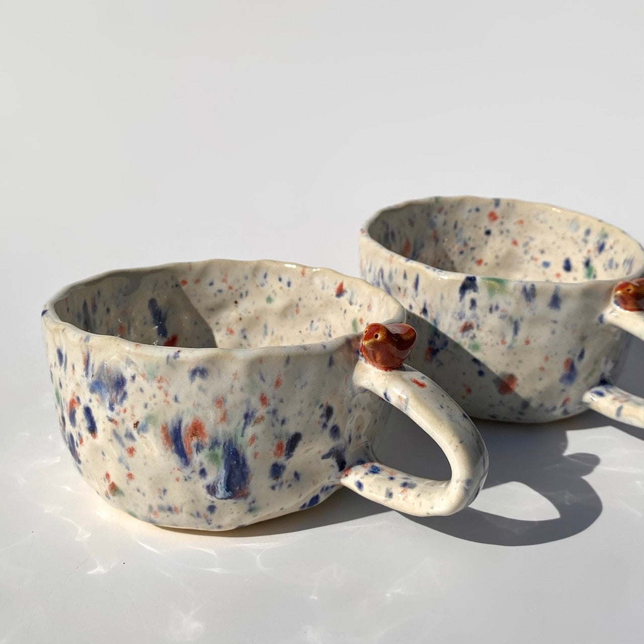 hrnek buclatý - ptáček