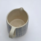 džbánek - proužek